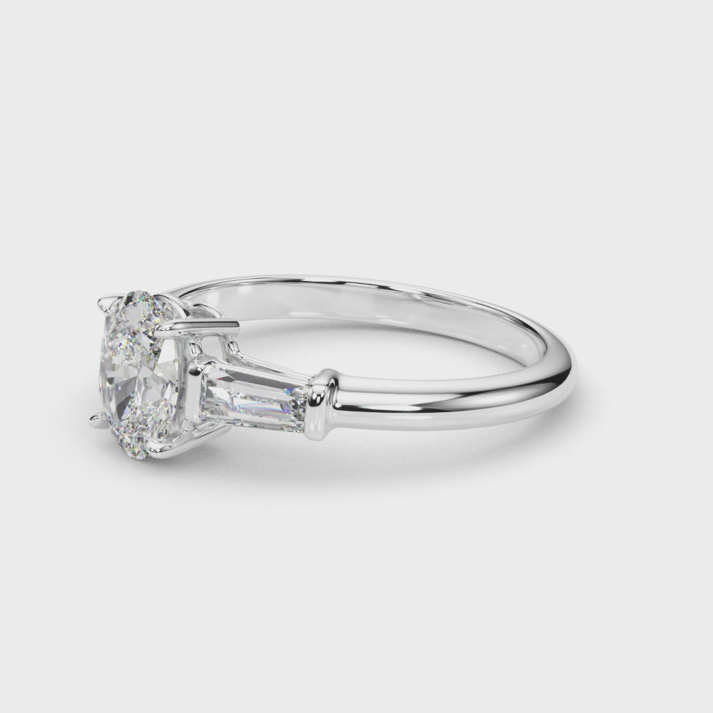 LUX-85329 Oval Cut Three Stone Engagement Ring With Tapered Baguettes