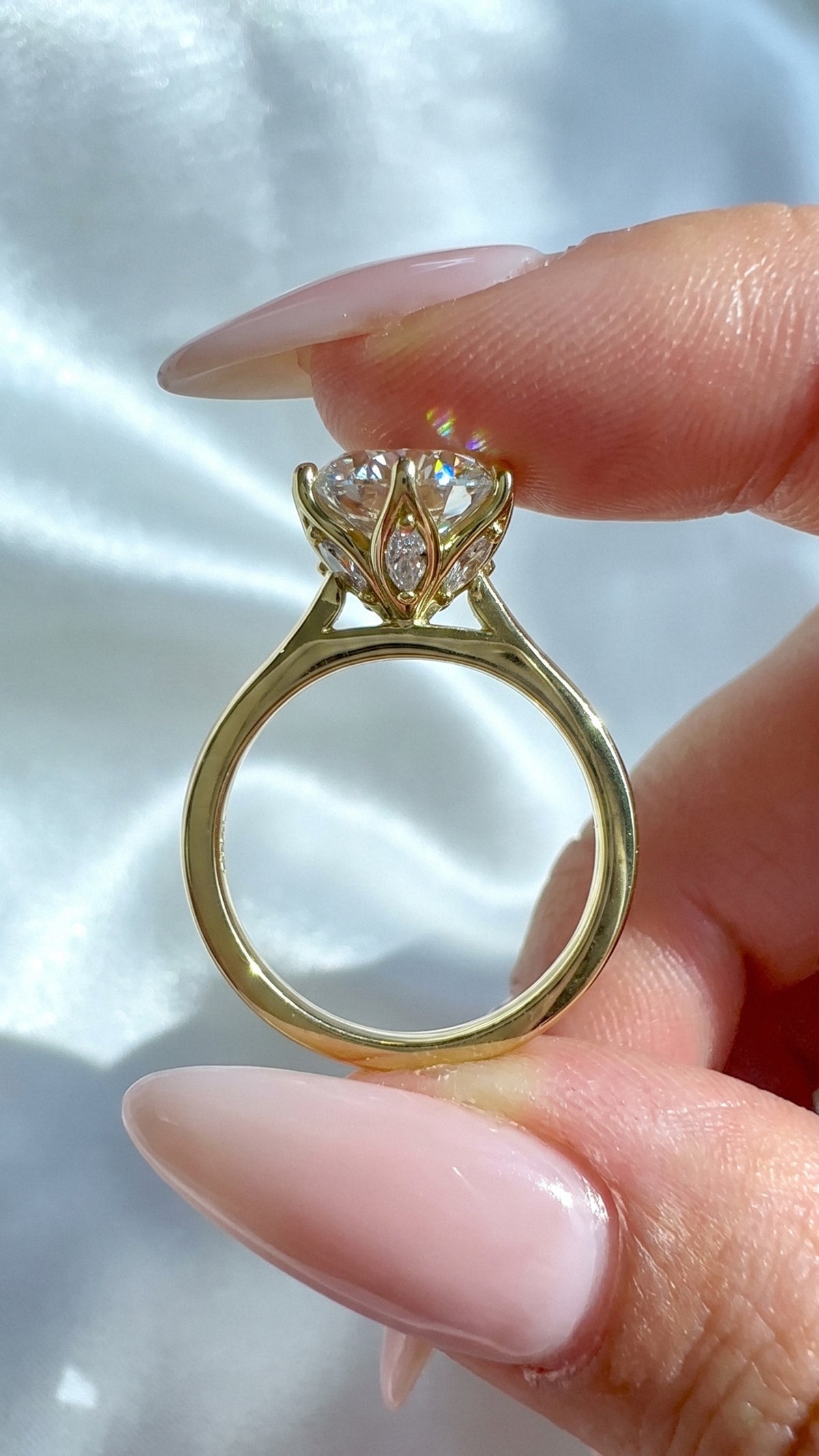 2.68ct D VVS2 round brilliant cut set in tulip setting