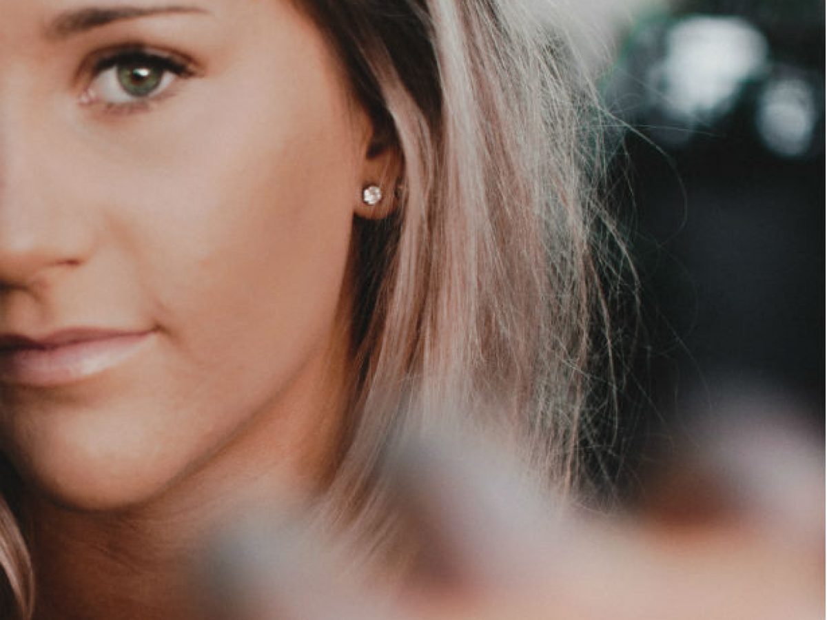 woman-wearing-diamond-earrings-mobile-1200x900