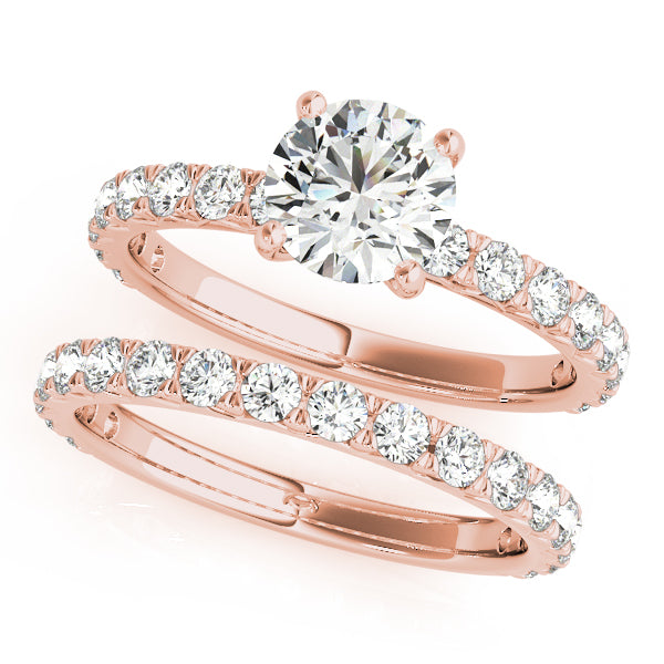 This beautiful pave diamond engagement ring is created to maximize the light that hits the diamonds from all around. Pink Gold