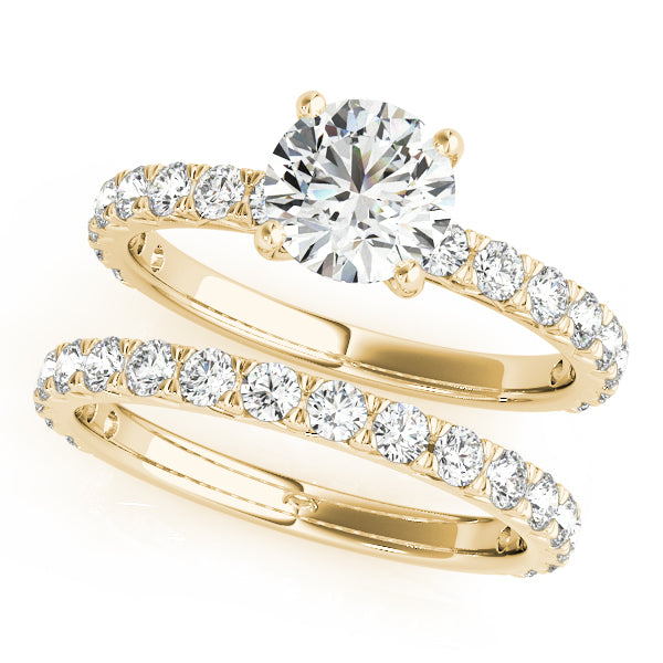 This beautiful pave diamond engagement ring is created to maximize the light that hits the diamonds from all around. Yellow Gold