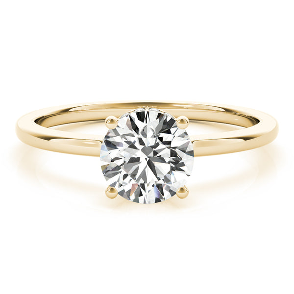 This elegant engagement ring features a sparkling hidden halo of diamonds that wraps around the center diamond.