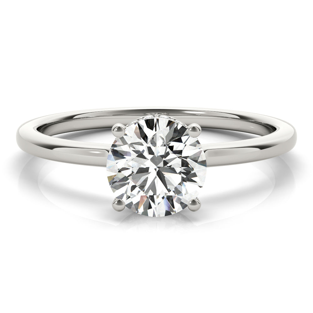 This elegant engagement ring features a sparkling hidden halo of diamonds that wraps around the center diamond.