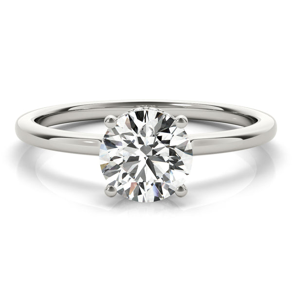 This elegant engagement ring features a sparkling hidden halo of diamonds that wraps around the center diamond.