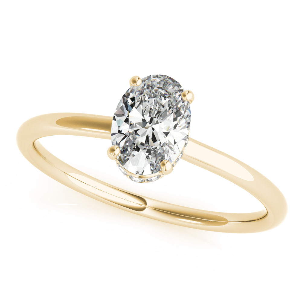 This elegant oval engagement ring features a sparkling hidden halo of diamonds that wraps around the center diamond.