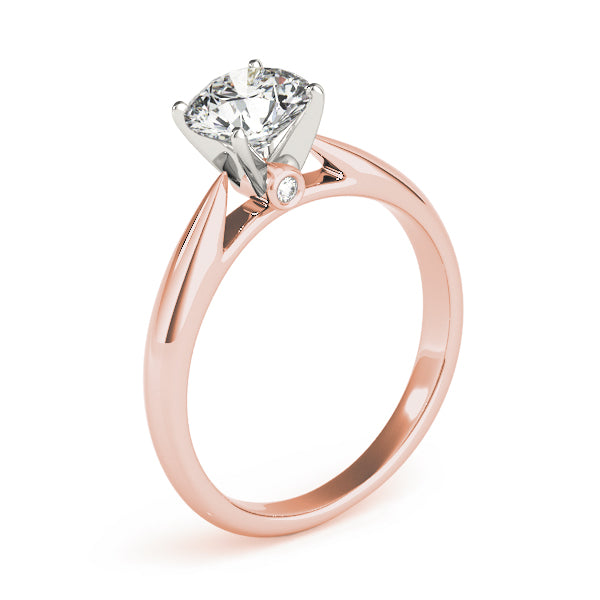 This elegant tapered cathedral solitaire is a timeless engagement ring design. Pink gold