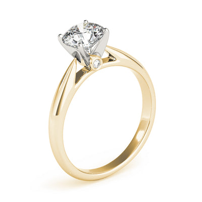 This elegant tapered cathedral solitaire is a timeless engagement ring design. Yellow gold