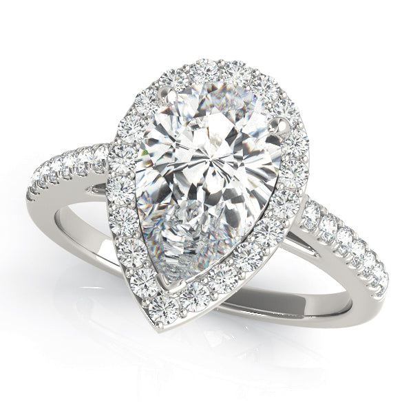 This elegant white gold pear shape halo engagement ring featuring pave set diamonds and your choice of center stone.