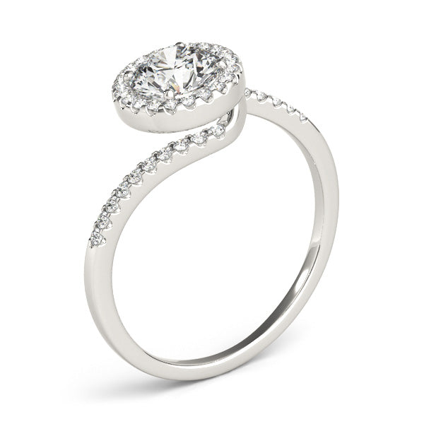 This elegant engagement ring has a twist, features micro pave set diamonds on the curved shank follow with a halo center stone of your choice.