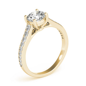 This beautiful diamond engagement ring showcases round diamonds that are set in pave design to accent your center diamond.