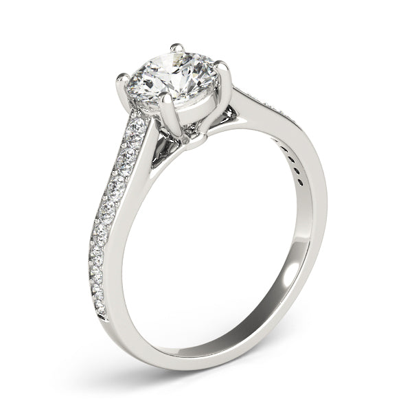 This beautiful diamond engagement ring showcases round diamonds that are set in pave design to accent your center diamond.