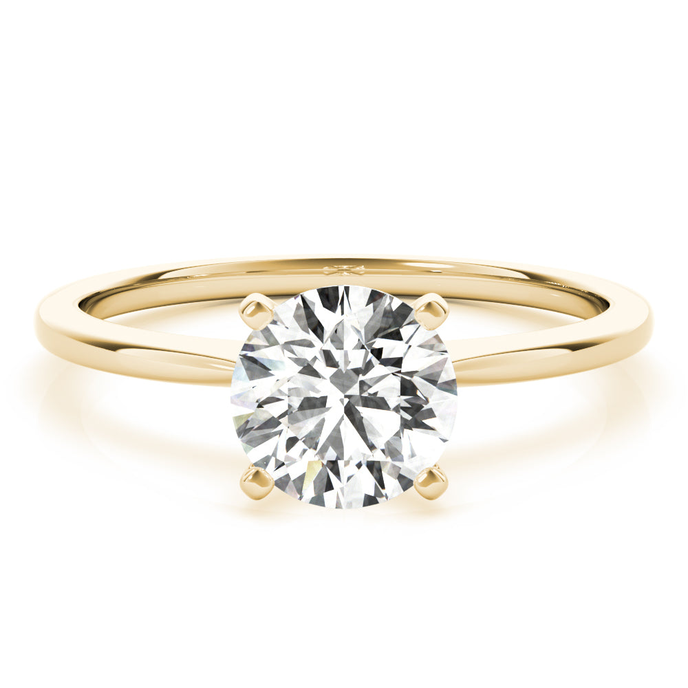 Simply elegant. This knife edge solitaire engagement ring is perfect to showcase the center diamond of your choice.
