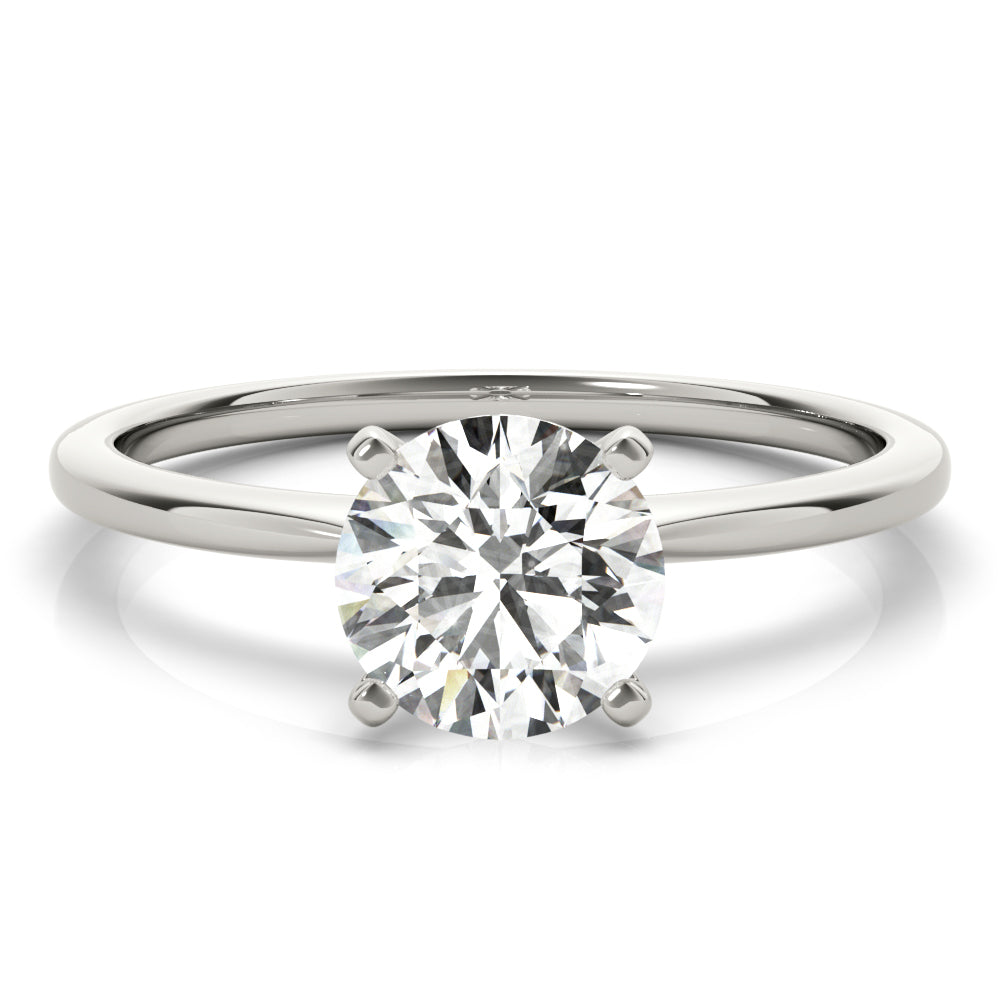 Simply elegant. This knife edge solitaire engagement ring is perfect to showcase the center diamond of your choice.