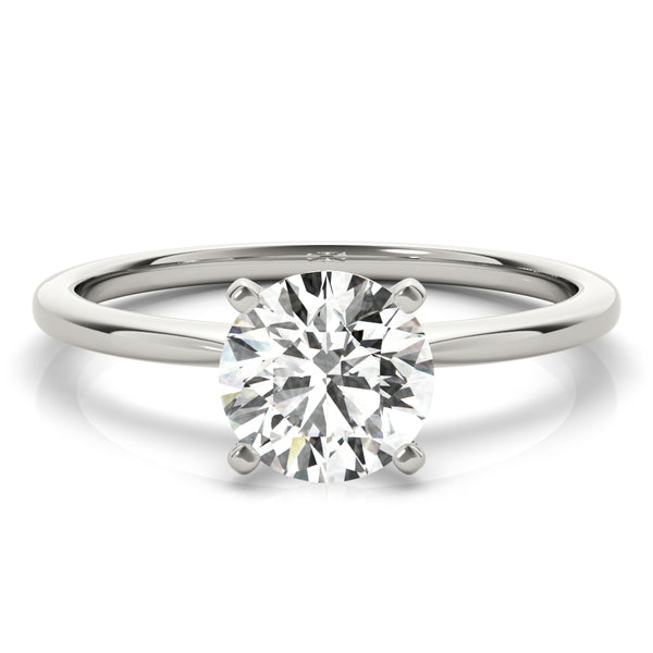 Simply elegant. This knife edge solitaire engagement ring is perfect to showcase the center diamond of your choice.