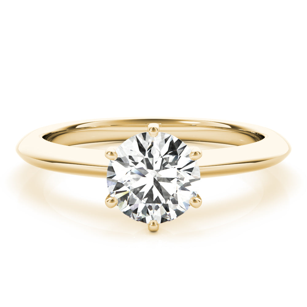 Simply elegant. This knife edge solitaire engagement ring is perfect to showcase the center diamond of your choice.