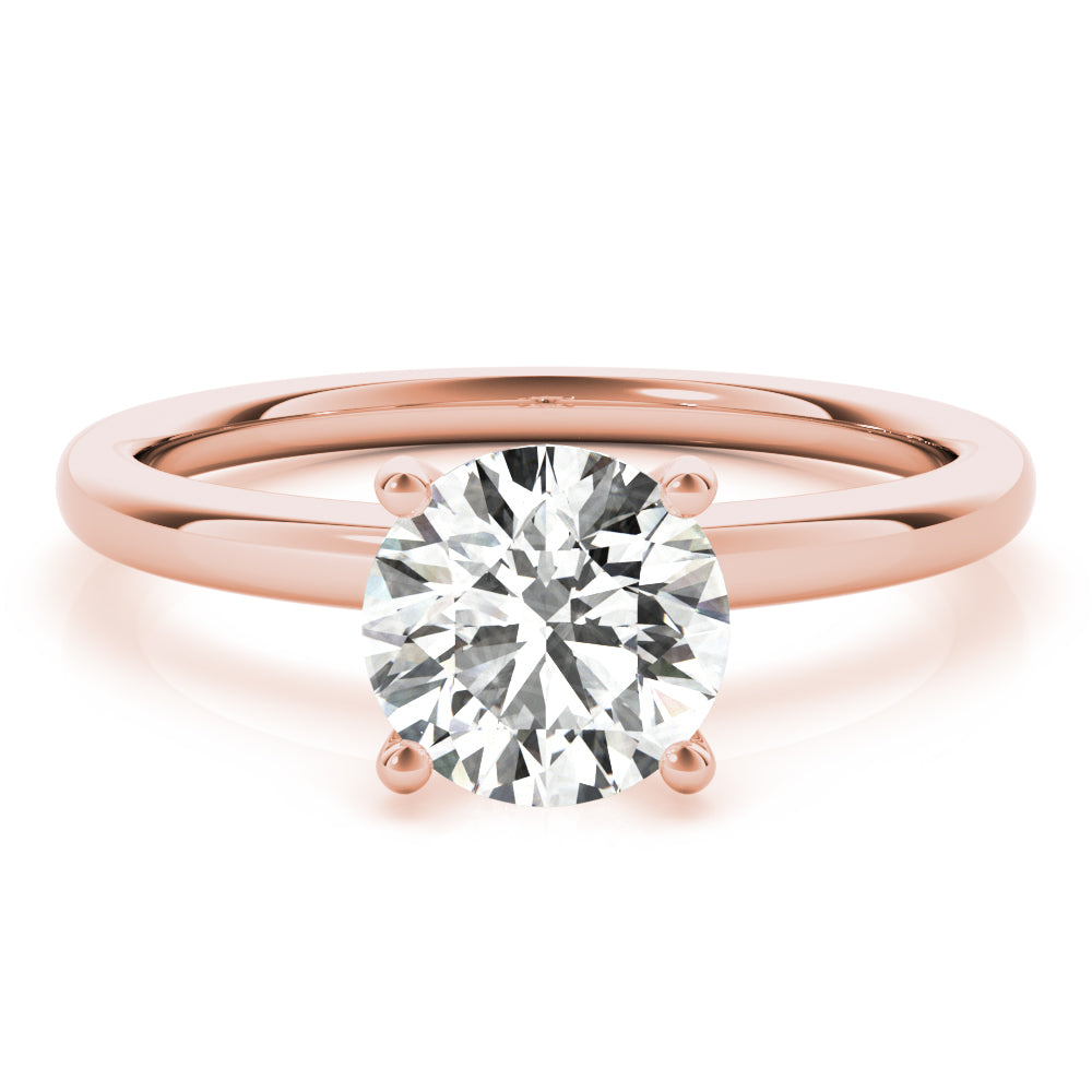 This classic solitaire engagement ring features modern decorative diamond crown.