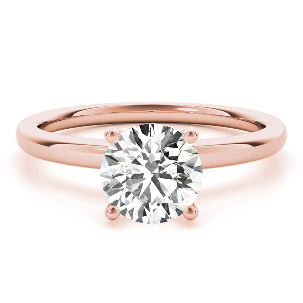 This classic solitaire engagement ring features modern decorative diamond crown.