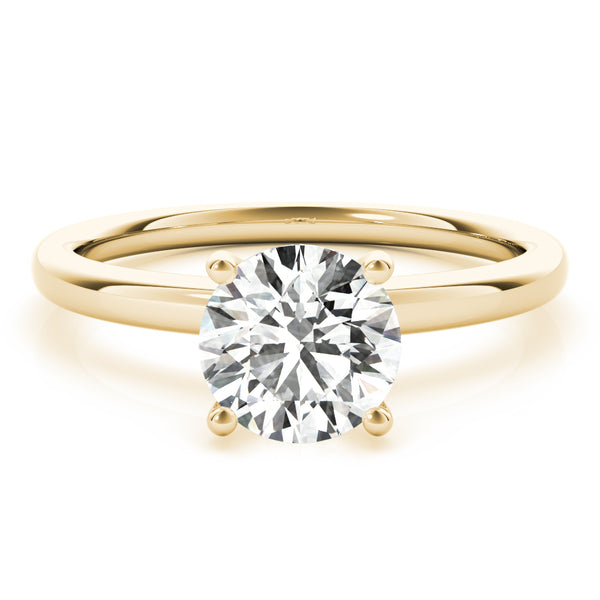 This classic solitaire engagement ring features modern decorative diamond crown.