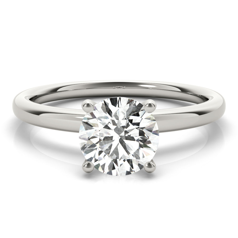 This classic solitaire engagement ring features modern decorative diamond crown.