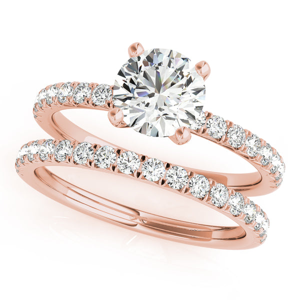 This beautiful pave diamond engagement ring is created to maximize the light that hits the diamonds from all around.
