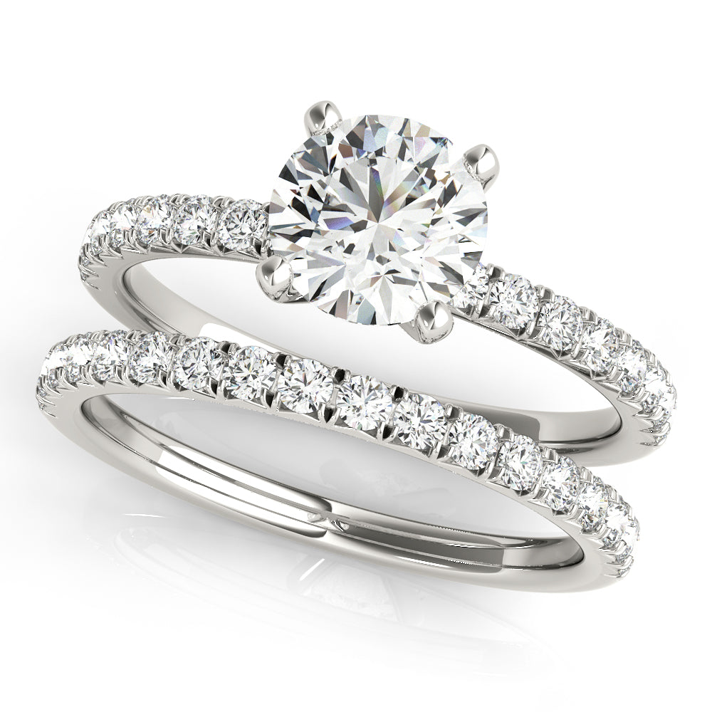 This beautiful pave diamond engagement ring is created to maximize the light that hits the diamonds from all around.
