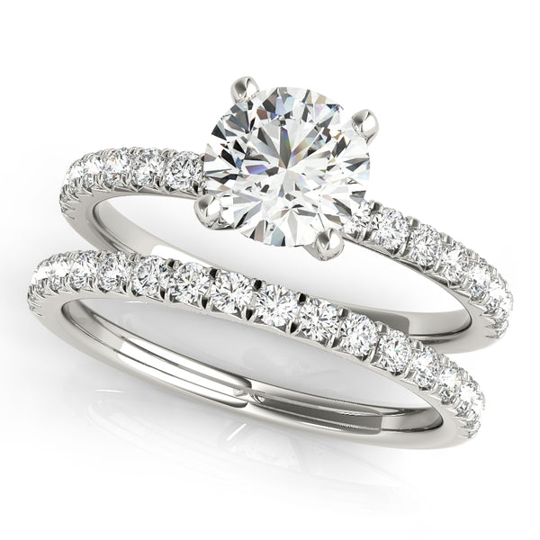 This beautiful pave diamond engagement ring is created to maximize the light that hits the diamonds from all around.