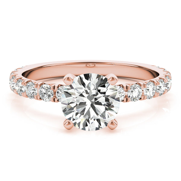This beautiful pave diamond engagement ring is created to maximize the light that hits the diamonds from all around