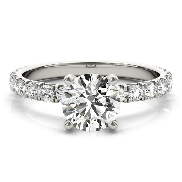 This beautiful pave diamond engagement ring is created to maximize the light that hits the diamonds from all around