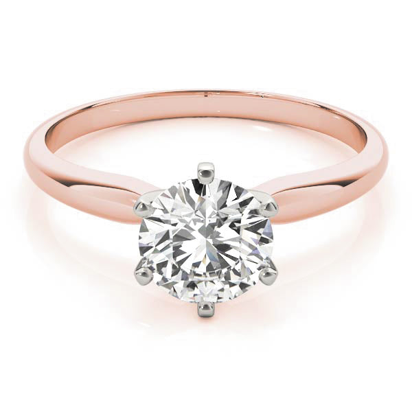 This six-claw solitaire is the ultimate classic engagement ring style.