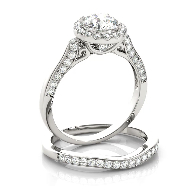 Beautiful in every way, this diamond engagement ring features round diamonds set in a halo design.