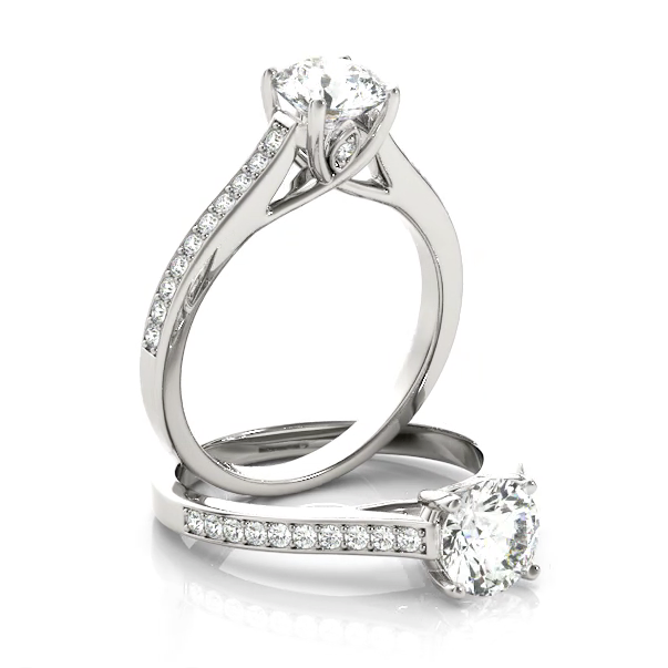 This delicate and beautiful diamond engagement ring features a half circle of sparkling petite pave diamonds to complement your center diamond.
