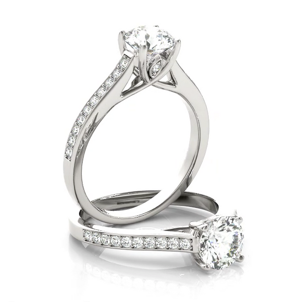 This delicate and beautiful diamond engagement ring features a half circle of sparkling petite pave diamonds to complement your center diamond.