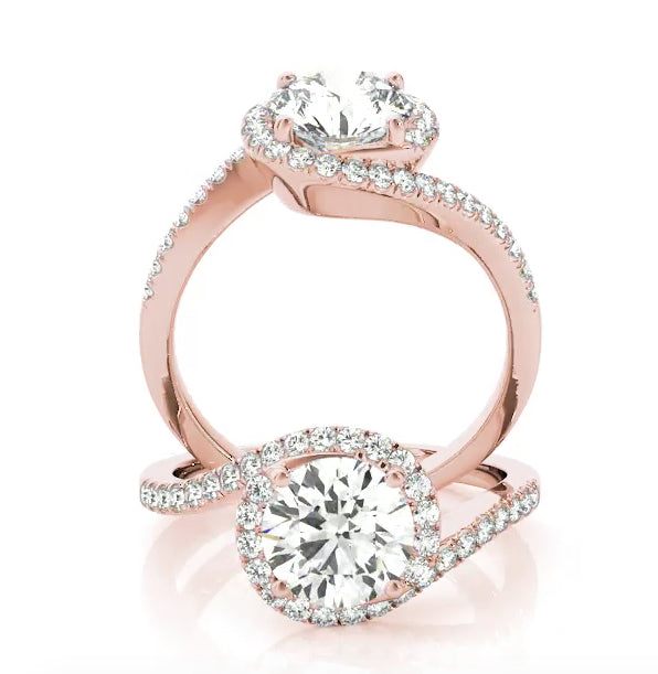 This modern engagement ring bypass features pave set diamonds with the center stone of your choice. Rose Gold