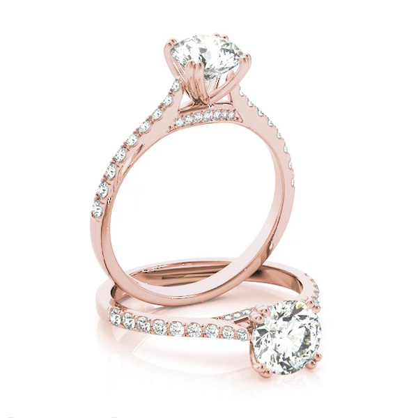 Delicate design  round halo engagement ring. Pink gold diamond