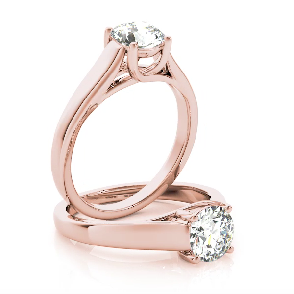 This Lucida solitaire engagement ring emphasize the center diamond. Rose Gold Diamond Ring