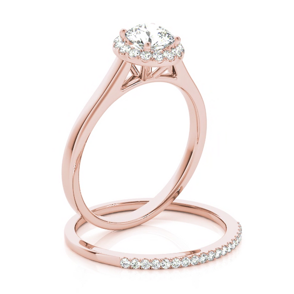 This classic halo engagement ring features a micro pave set diamonds around the center gem. Pink Gold