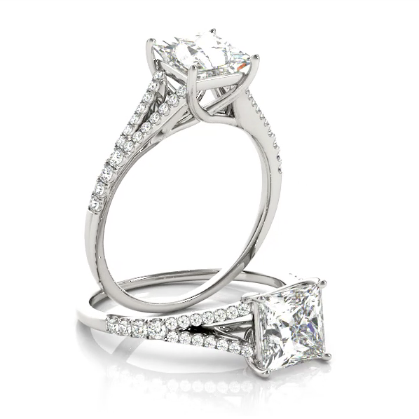 This unique design diamond engagement ring features a split shank pave set diamonds to compliment the center stone of your choice. 14 and 18 k available